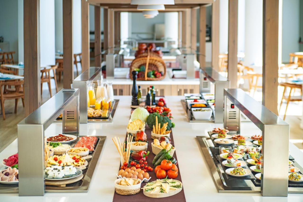 Cabogata Beach Hotel Retamar  Eksteriør billede A buffet at a hotel